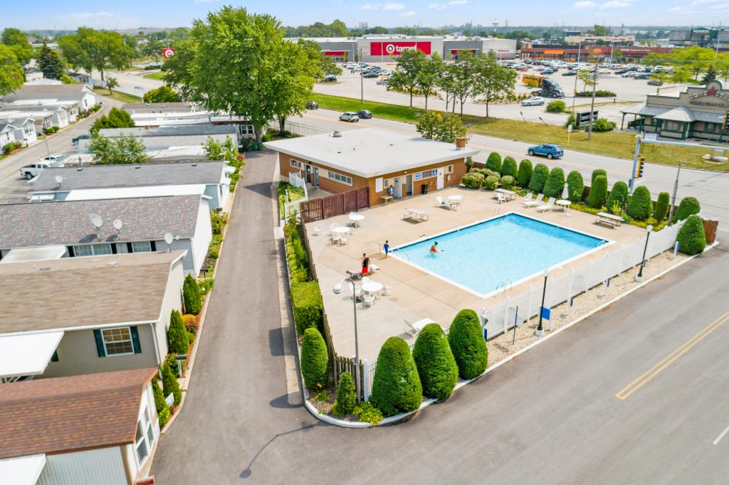 Aerial view of community swimming pool - Find manufactured homes for sale near Chicago