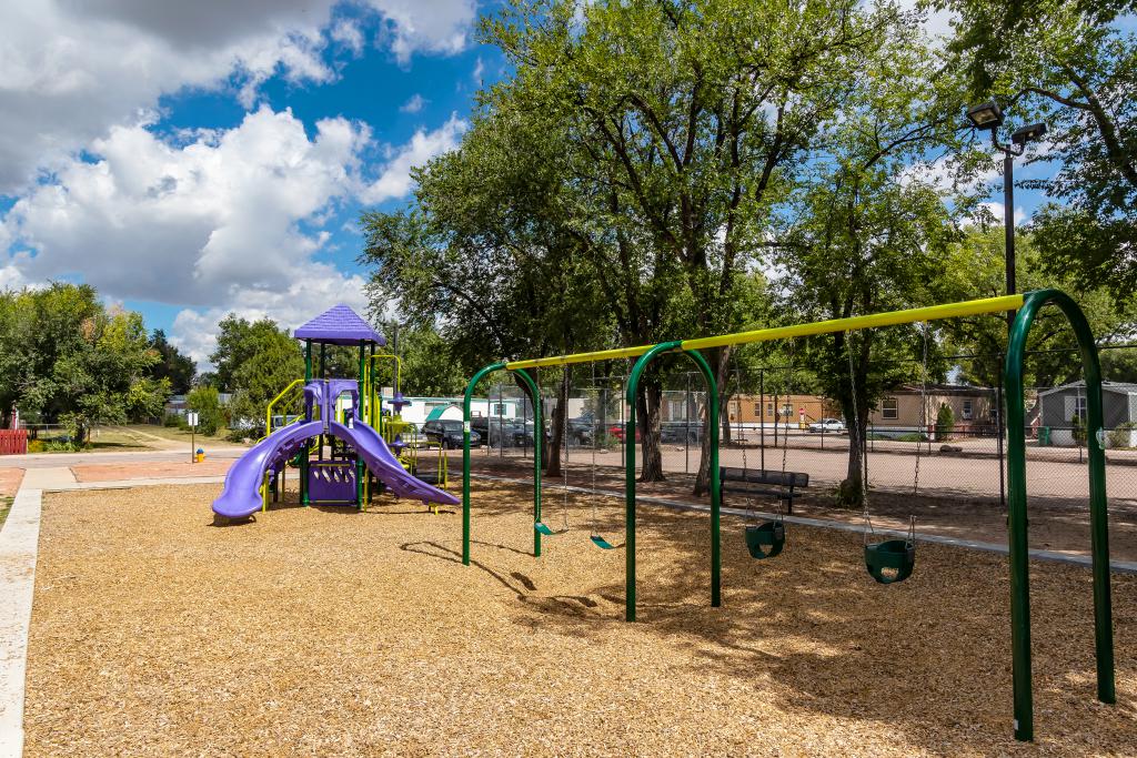 Playground at one of our popular manufactured home communities in Colorado Springs - Find modular homes Colorado Springs