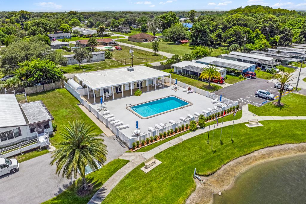 aerial view of the pool and clubhouse at Winter Haven manufactured home community